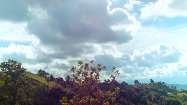 A timelapse of a cloud passing by the sun in a mountainous area of Chimaltenango, Guatemala