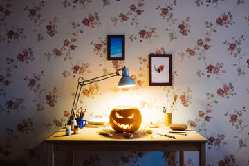 Halloween pumpkin is on the table