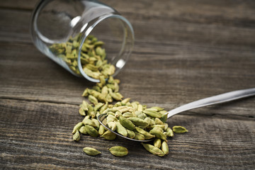 Cardamom  on a gray wooden background
