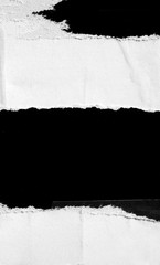 Black white old grunge ripped torn vintage collage posters creased crumpled paper surface texture background backdrop placard / Space for text	
