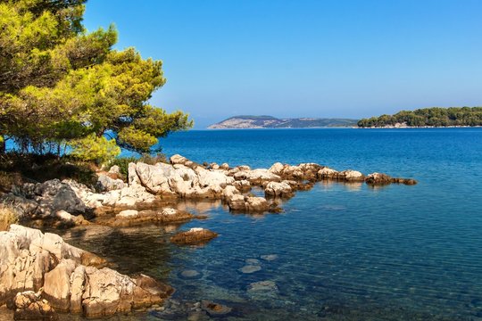 Croatian coast. Sea view from the island of Hvar. Greetings from vacation. Seas and rocks on the coast.