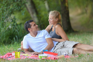 young couple on a picnic on a sunny