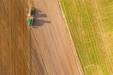 Tractor Ploughing Field Aerial View