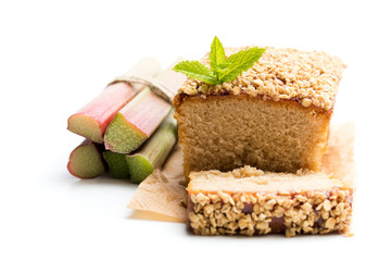 Homemade  rhubarb cake topped with sweetened oats isolated on white