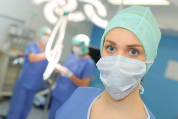 close up portrait of young female surgeon doctor