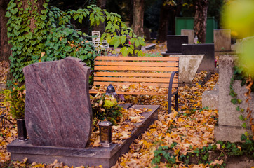 bank during All Saints Day in cemetery
