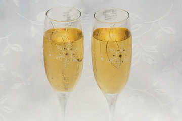 Two Glasses of Champagne . on a White Background. Top View. New Year Concept.