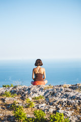 Girl at the top of the mountain.