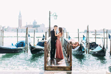 Fototapeta na wymiar Couple on a honeymoon in Venice