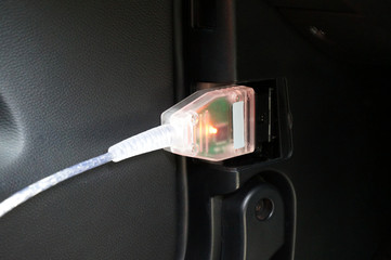 Diagnostic interface connected to cars OBD2 port