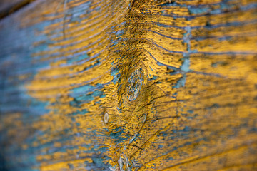 Wooden textured waves background colored yellow and blue