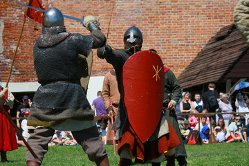 Knights fighting on tournament in Czersk castle, south of Warsaw, Mazovia, Poland - obrazy, fototapety, plakaty
