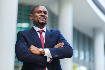 Fototapeta premium Confident african manager portrait ina modern urban setting