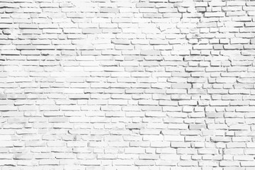 Simple white and grey brick wall as seamless surface pattern texture background. Vector illustration.