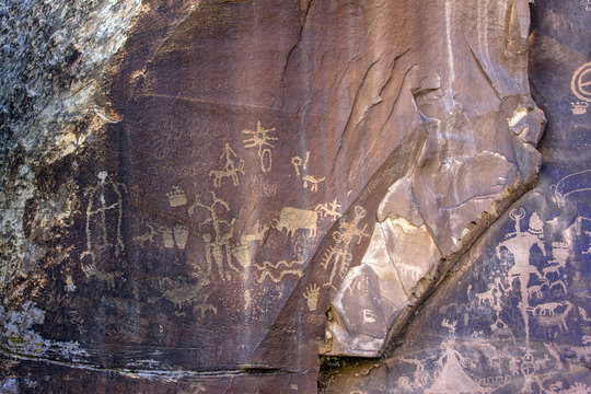 Newspaper Rock in San Juan County, Utah, features one of the largest known collections of petroglyphs, dating back 2,000 years
