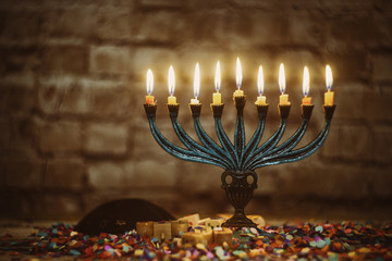 Jewish ritual holiday Hanukkah menorah traditional burning candles © ungvar