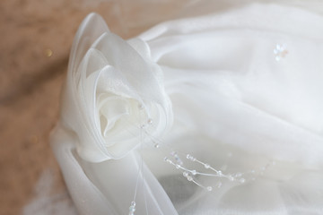 Obraz na płótnie Canvas Wedding veil detail motif flower dress in bridal gown. Bride's morning wedding preparation concept