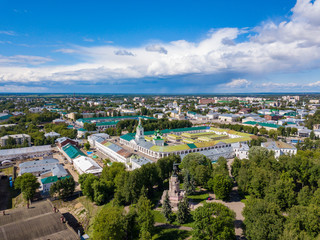 Fototapeta na wymiar Aerial view to Kostroma city center with old trace buildings, churches and Central park with Lenin monument at summer.