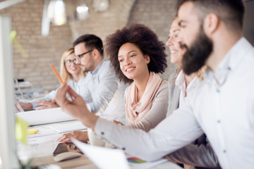 Business people discussing the charts and graphs