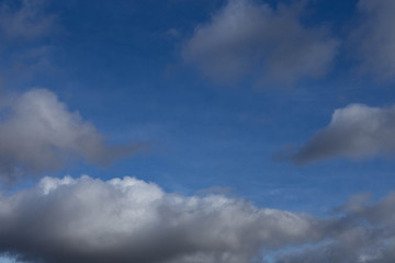 white clouds on blue sky