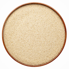 ivory teff grain in isolated round tray