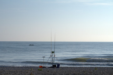 fishing on the beach,sea,horizon,sky,summer,wave