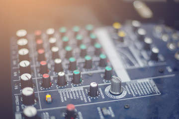 Audio mixer controller in the control room