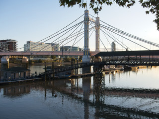 River Thames, Albert bridge and Cadogan Pier at dusk.