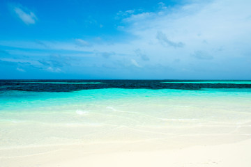 Beautiful landscape of clear turquoise Indian ocean, Maldives islands