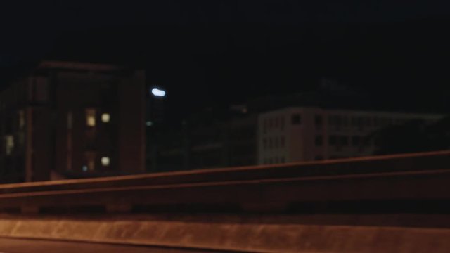 athletic women running race competitive runners sprinting competition in late night urban city endurance challenge