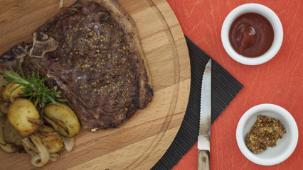 juicy portions of grilled fillet steak on dark background