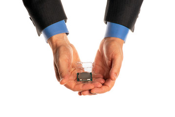 Fototapeta premium CPU device in the hands, isolated on a white