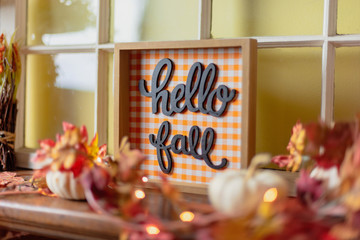 Hello fall sign on the mantel at home