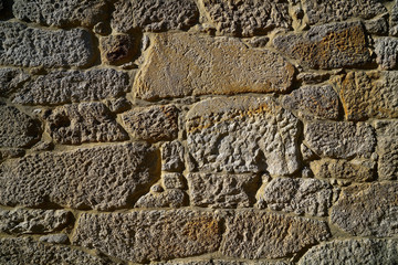 Granite stone bush hammered masonry wall