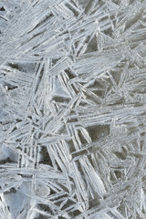Rime, frost, ice texture. ice pattern texture. Ice on the winter lake. Closeup.