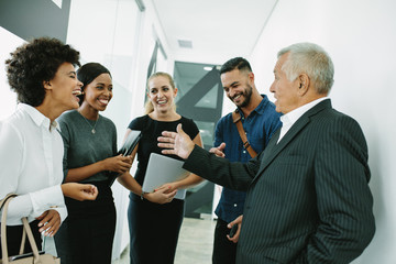 Corporate professional having informal meeting