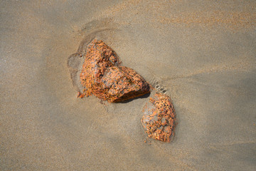 Granite Porrino stone in Galician beach sand shore