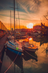 Panoramic view of old port of Genoa at sunset, Liguria, Italy - obrazy, fototapety, plakaty
