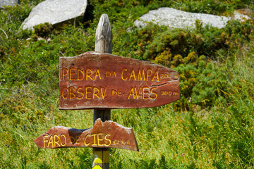 Islas Cies islands lighthouse Faro Cies sign in wood © lunamarina