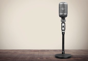 Retro style microphone on  background