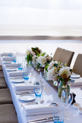 Table setting for an event, with colours reflecting seaside setting