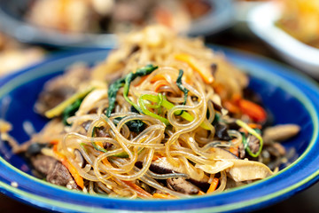Japchae is a traditional Korean food which is mixed dish of boiled bean threads, stir-fried vegetables, and shredded meat. This dish usually eats every famous Korea thanksgiving holiday called Chuseok