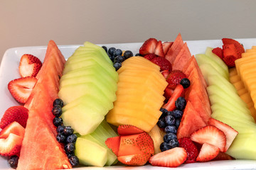 Fresh fruit platter including watermelon, cantaloupe, honeydew melon