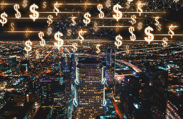 Dollars with Downtown Los Angeles at night