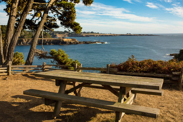 Picnic table at overlook on cliff in Mendocino, California