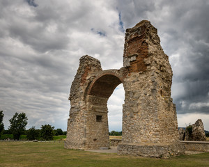 Heathens' Gate in Petronell Carnuntum on a stormy, cloudy day