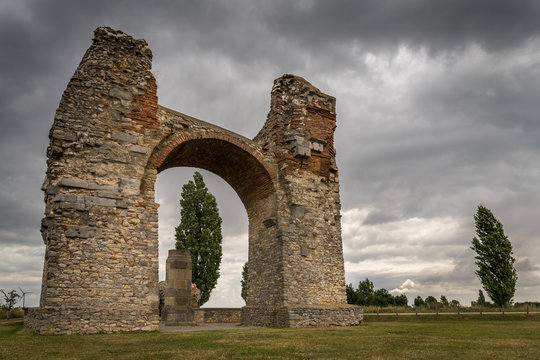 Heathens' Gate in Petronell Carnuntum on a stormy, cloudy day
