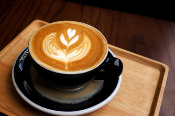 Coffee Latte on wood background