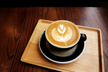 Coffee Latte on wood background