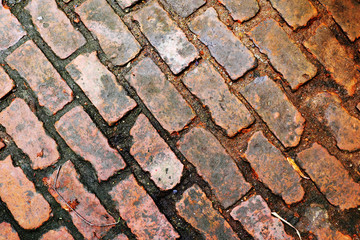 Old red brick walkway background